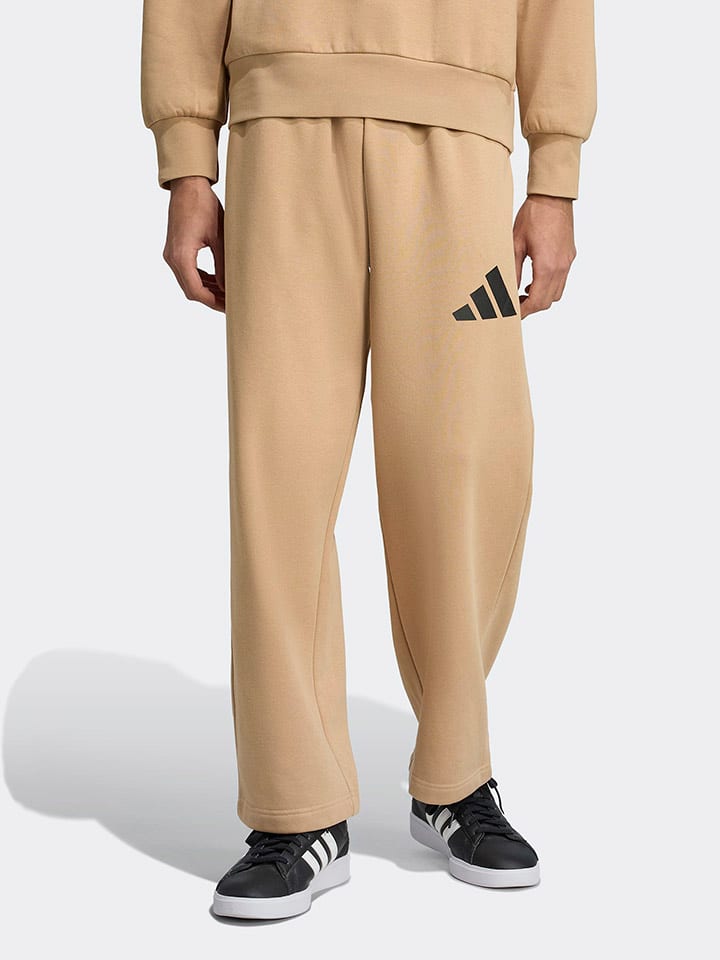 Adidas Бежевые спортивные штаны
Adidas Бежевые спортивные штаны
