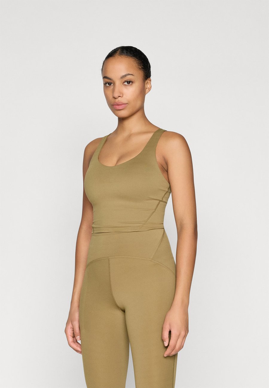 Бюстгальтер The North Face JAIDA LONG LINE BRA, Cedar/Taupe
Бюстгальтер The North Face JAIDA LONG LINE BRA, Cedar/Taupe