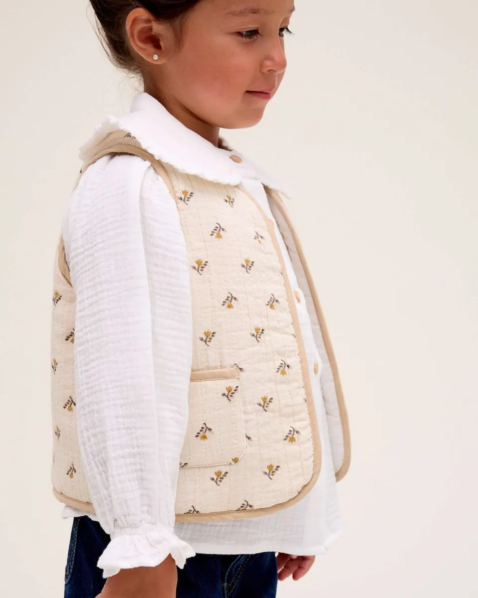 Жилет для девочки с цветочным принтом Dadati, бежевый
Жилет для девочки с цветочным принтом Dadati, бежевый