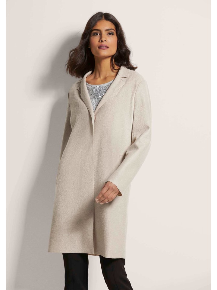 MADELEINE Короткое шерстяное пальто цвета гальки
MADELEINE Короткое шерстяное пальто цвета гальки