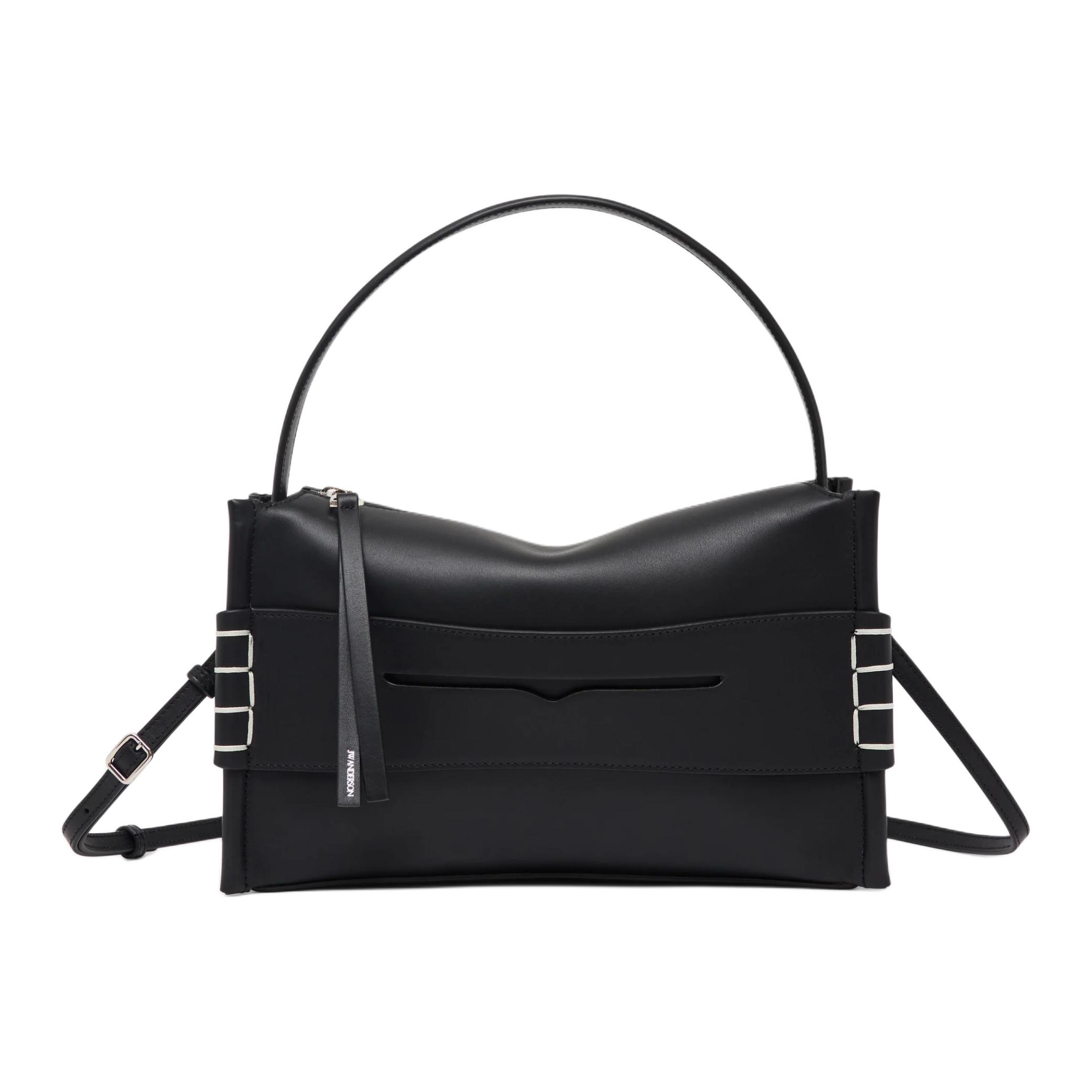 JW Anderson Средняя женская сумка из коровьей кожи черная
JW Anderson Средняя женская сумка из коровьей кожи черная