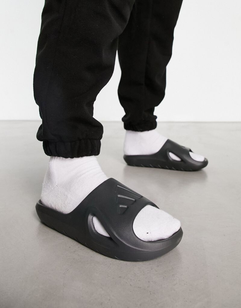 Adidas Training - Adicane - Ползунки нейтрального черного цвета adidas
Adidas Training - Adicane - Ползунки нейтрального черного цвета adidas