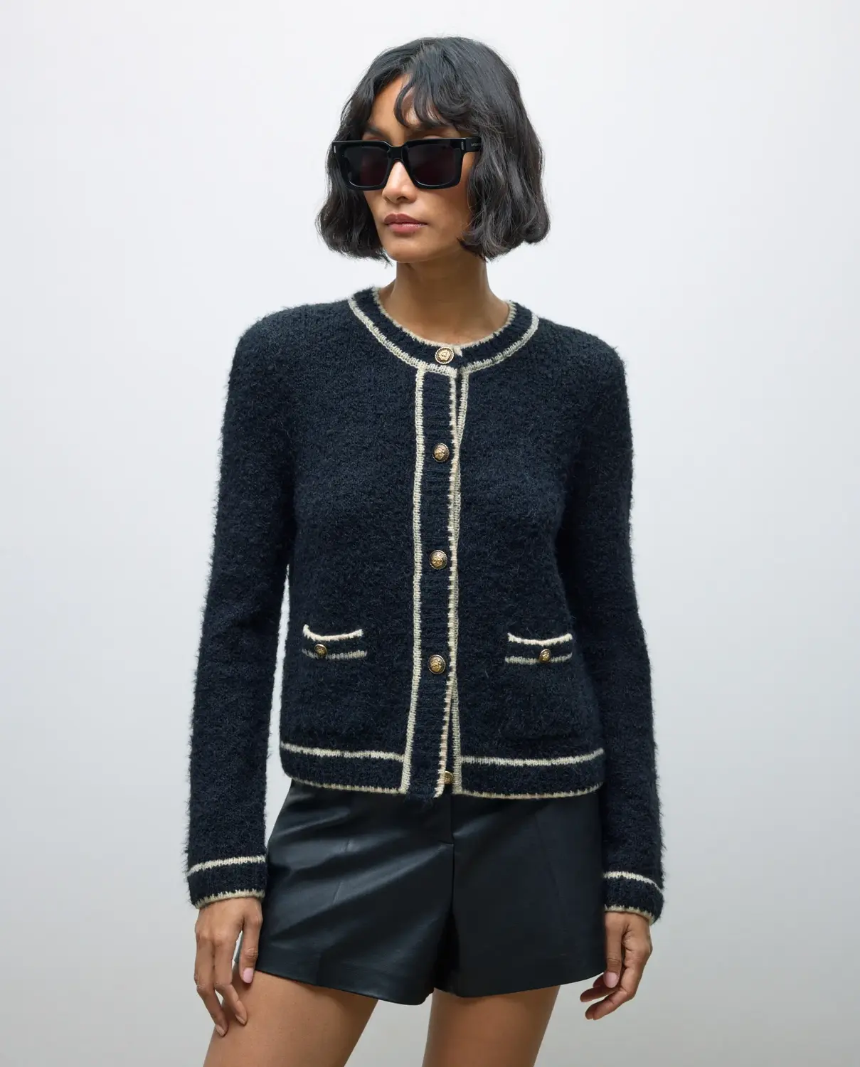 Женская вязаная куртка с контрастными вставками Tintoretto, черный
Женская вязаная куртка с контрастными вставками Tintoretto, черный