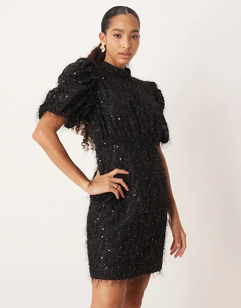 Мини-платье YAS с пышной текстурой и пайетками черного цвета
Мини-платье YAS с пышной текстурой и пайетками черного цвета