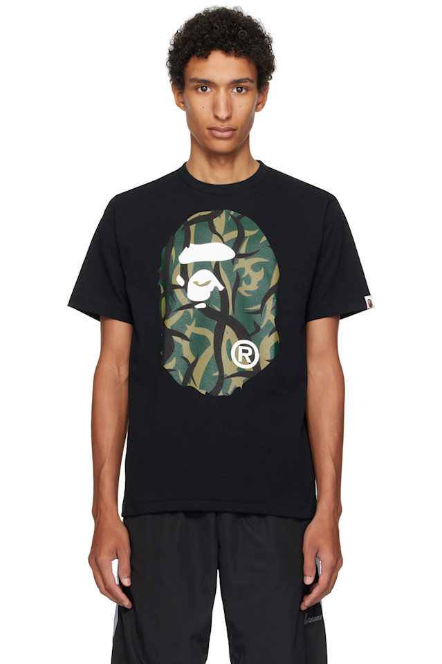 Bape Черная камуфляжная футболка с изображением головы большой обезьяны
Bape Черная камуфляжная футболка с изображением головы большой обезьяны