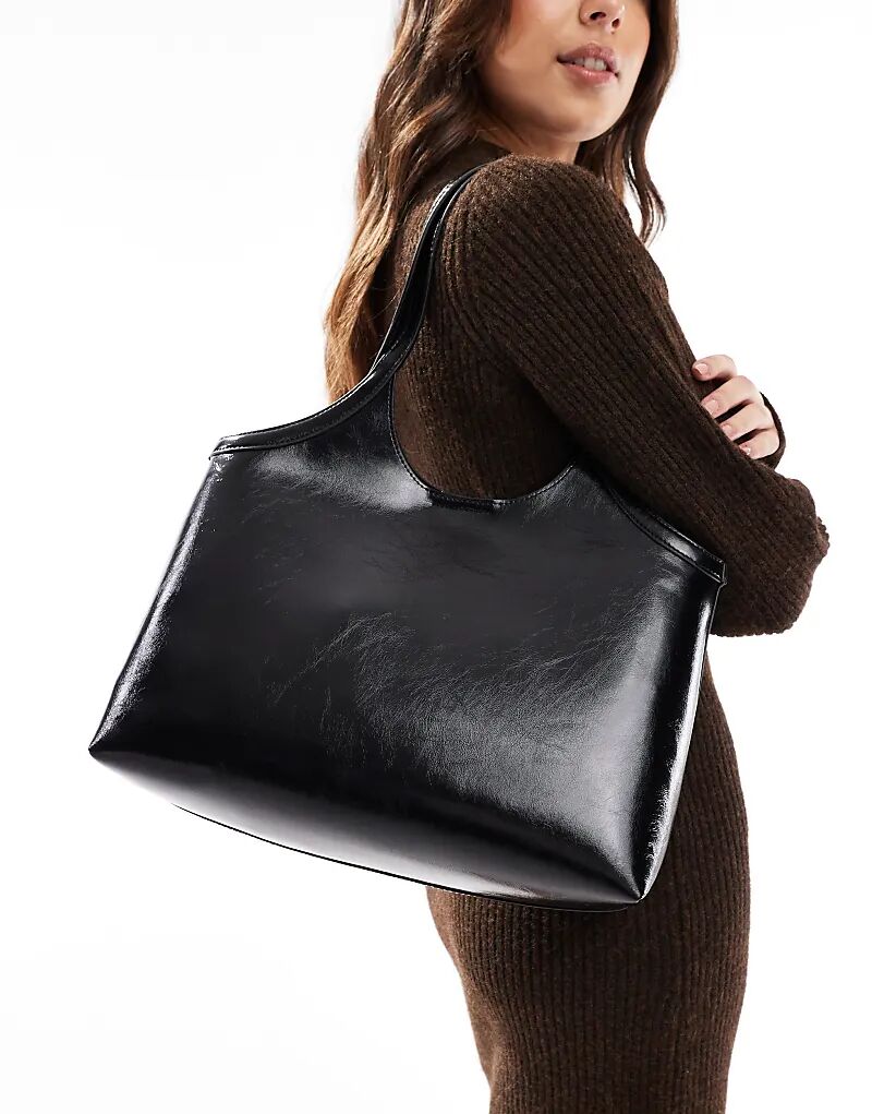 Сумка-тоут ASOS DESIGN с круглыми ручками черного цвета
Сумка-тоут ASOS DESIGN с круглыми ручками черного цвета