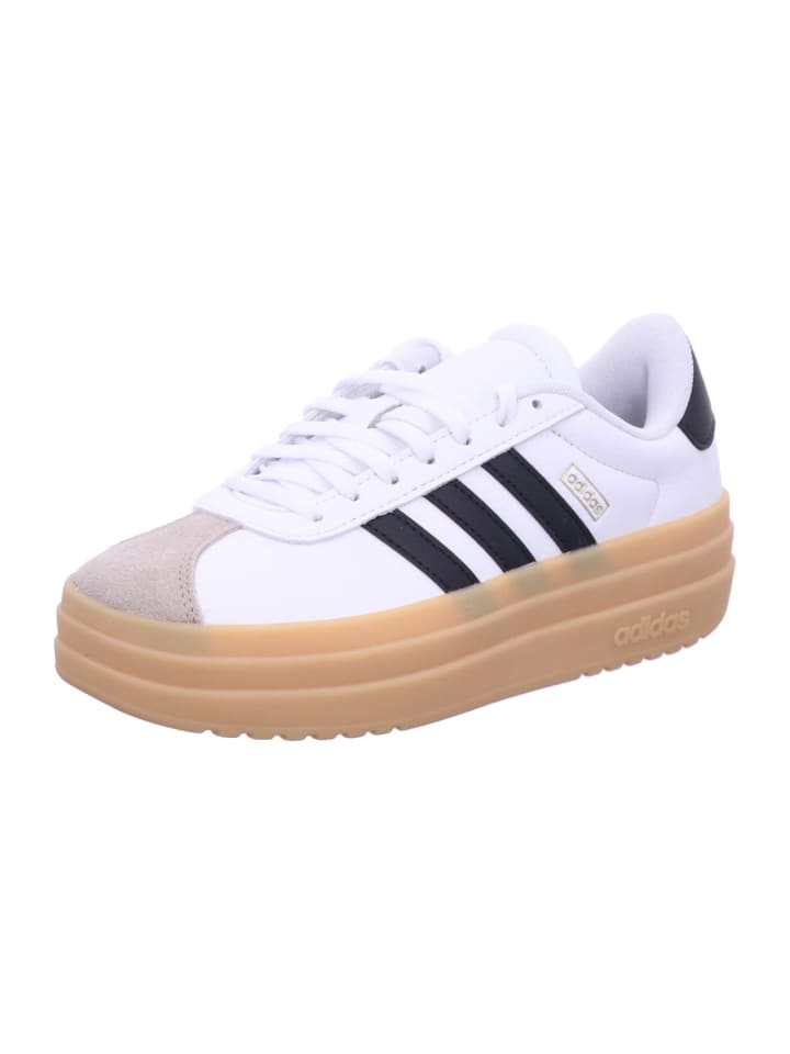 Белые низкие кеды adidas
Белые низкие кеды adidas