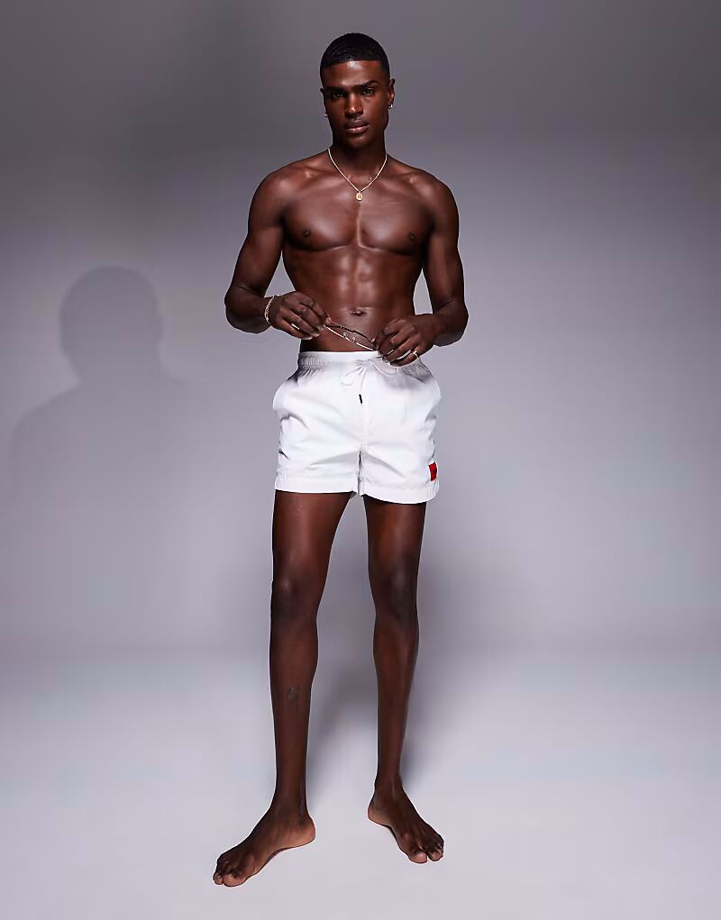 Шорты для плавания HUGO RED с логотипом Dominica, белого цвета
Шорты для плавания HUGO RED с логотипом Dominica, белого цвета