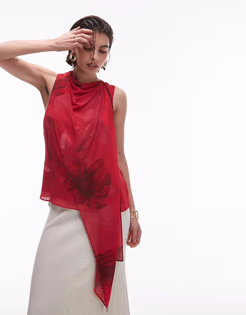 Асимметричный топ из атласа манго с размытым красным цветочным принтом Mango
Асимметричный топ из атласа манго с размытым красным цветочным принтом Mango