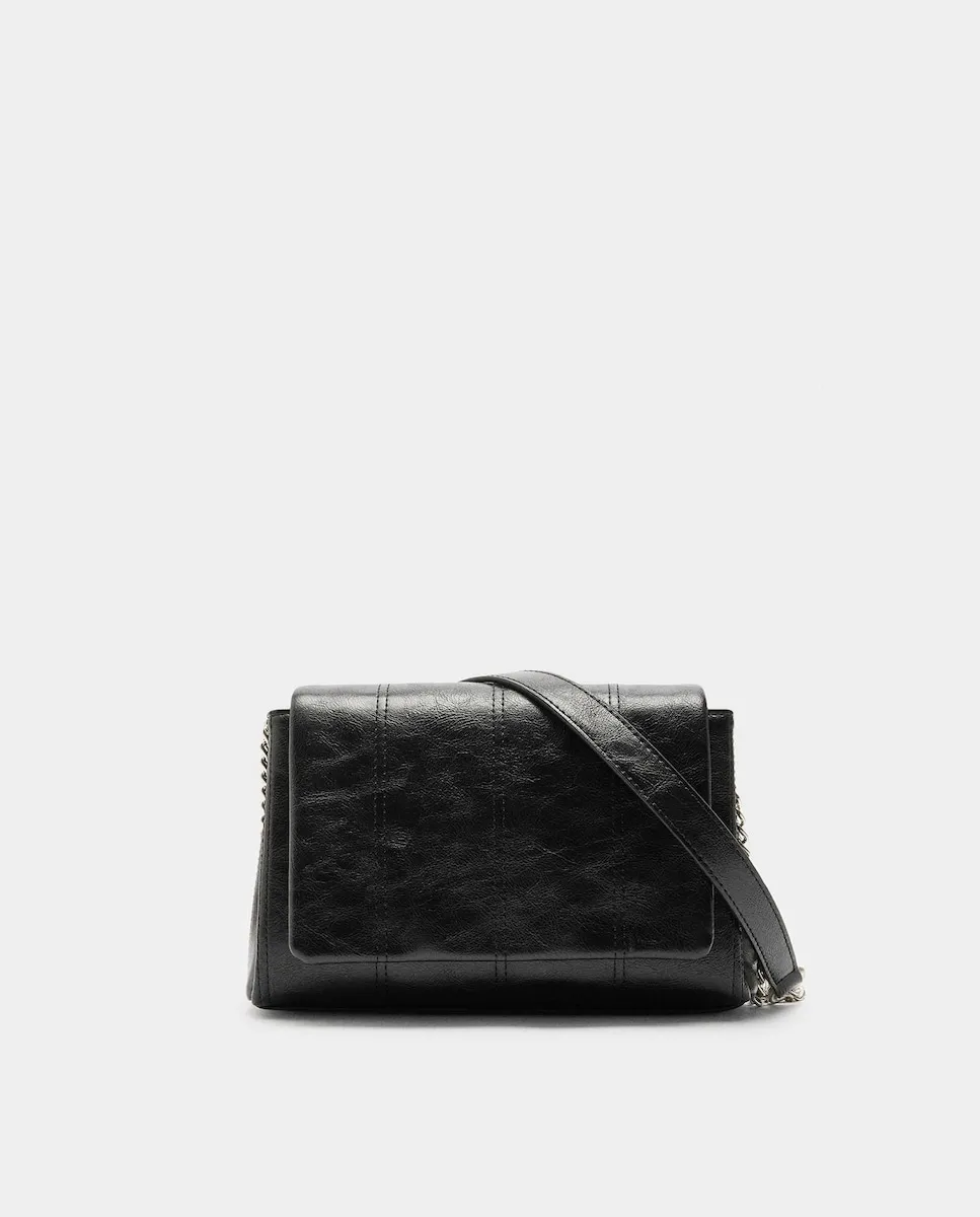 Сумка через плечо с клапаном и магнитной застежкой на однотонной поверхности Parfois, черный
Сумка через плечо с клапаном и магнитной застежкой на однотонной поверхности Parfois, черный