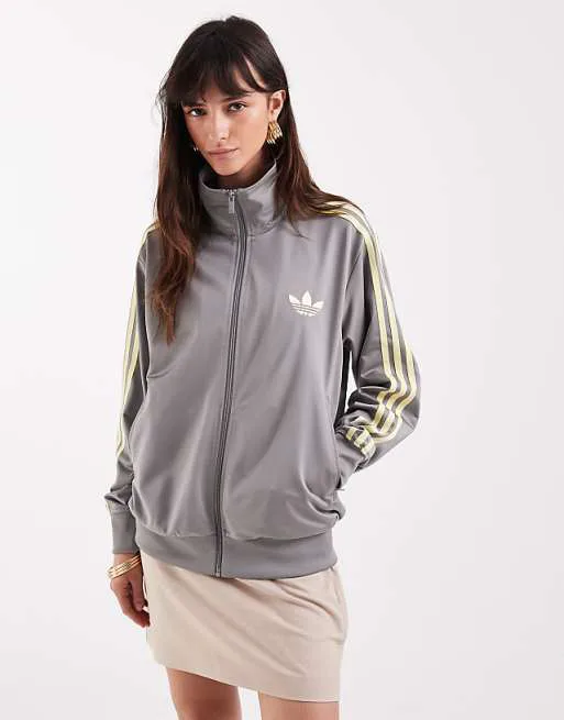 Серо-желтый свободный спортивный топ adidas Originals x ASOS Firebird
Серо-желтый свободный спортивный топ adidas Originals x ASOS Firebird