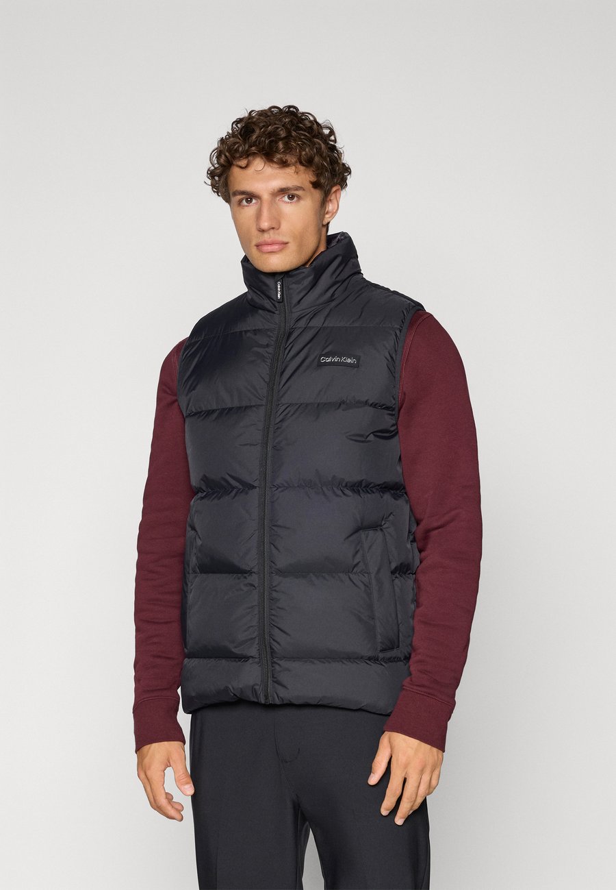 Куртка Calvin Klein Golf RIVINGTON PADDED GILET, Black
Куртка Calvin Klein Golf RIVINGTON PADDED GILET, Black
