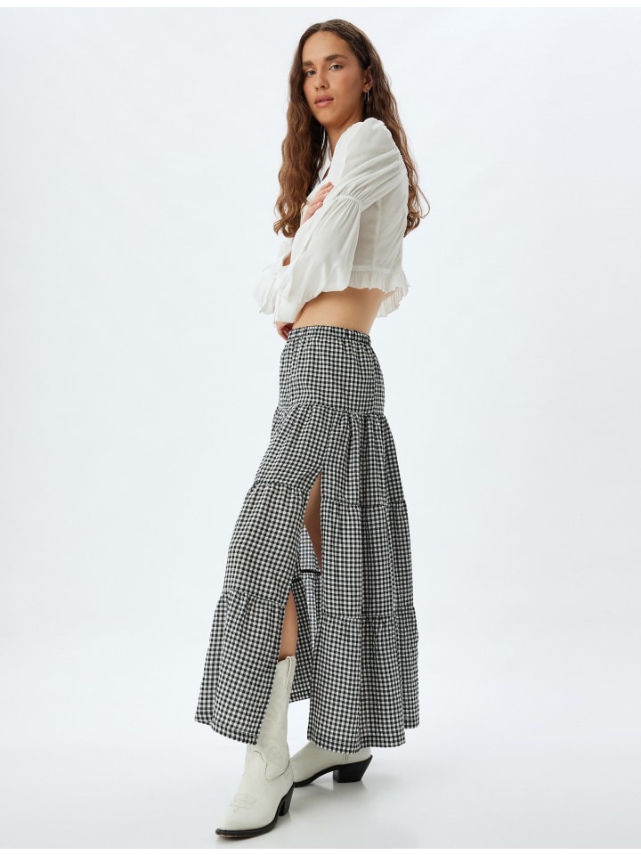 Длинные юбка KOTON, цвет schwarz karomuster
Длинные юбка KOTON, цвет schwarz karomuster