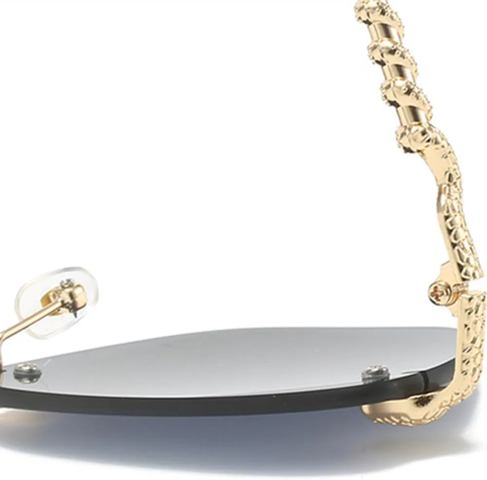 Винтажные солнцезащитные очки MUTYNE без оправы для женщин и мужчин, модные солнцезащитные очки с металлическим змеиным рисунком, роскошные солнцезащитные очки, Blue
Винтажные солнцезащитные очки MUTYNE без оправы для женщин и мужчин, модные солнцезащитные очки с металлическим змеиным рисунком, роскошные солнцезащитные очки, Blue