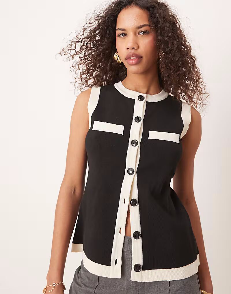 Топ контрастного трикотажа Pretty Lavish черного и кремового цвета
Топ контрастного трикотажа Pretty Lavish черного и кремового цвета