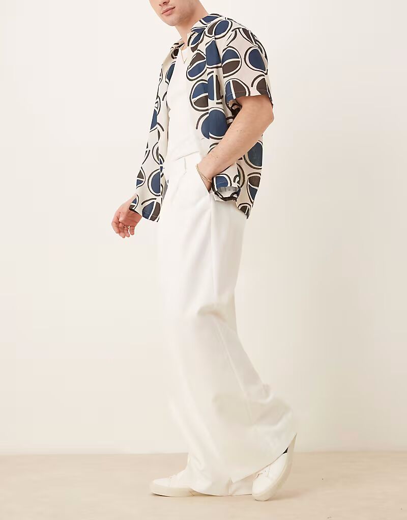 Брюки свободного кроя ASOS DESIGN белого цвета со складками спереди
Брюки свободного кроя ASOS DESIGN белого цвета со складками спереди