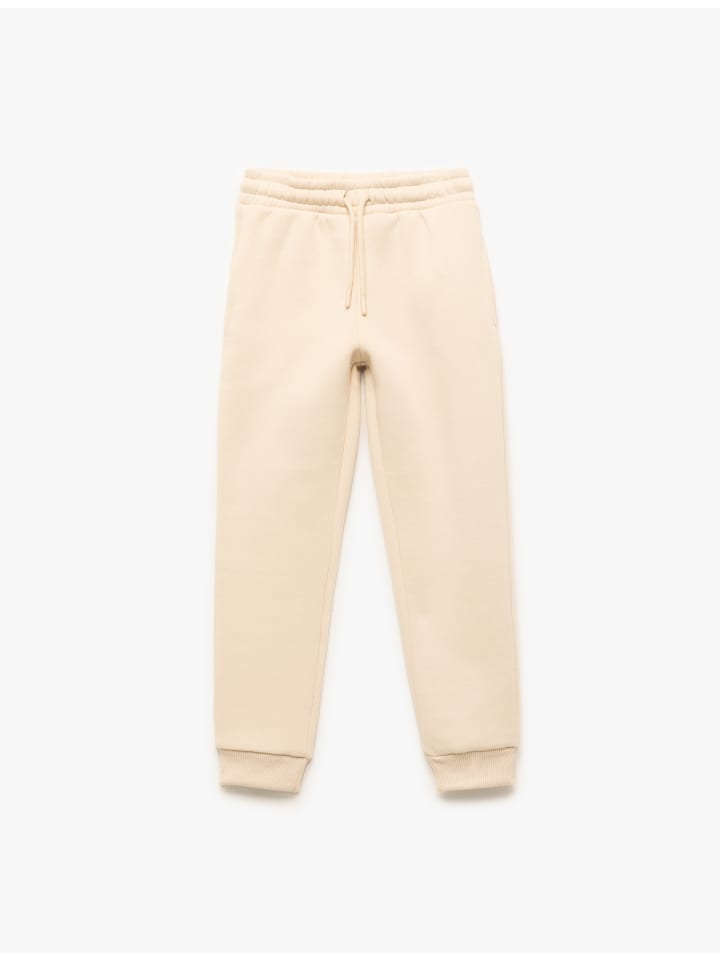 Спортивные брюки бежевого цвета KOTON
Спортивные брюки бежевого цвета KOTON