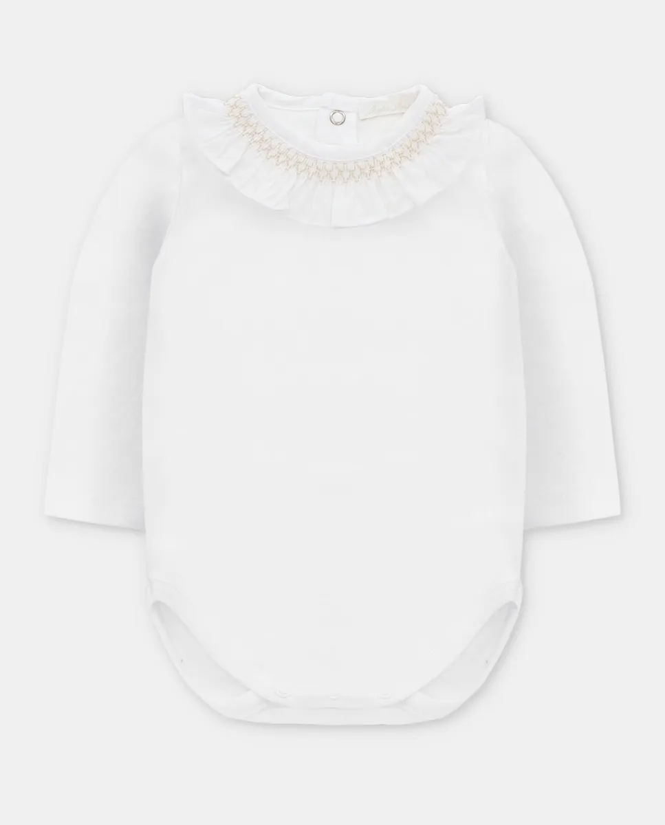 Боди для младенца из интерлока белого цвета с воланным воротником, вышитым в песочном оттенке Martín Aranda
Боди для младенца из интерлока белого цвета с воланным воротником, вышитым в песочном оттенке Martín Aranda