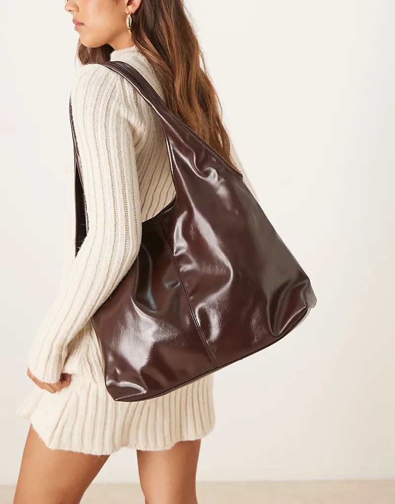 Сумка-тоут ASOS DESIGN с круглой ручкой шоколадного цвета
Сумка-тоут ASOS DESIGN с круглой ручкой шоколадного цвета