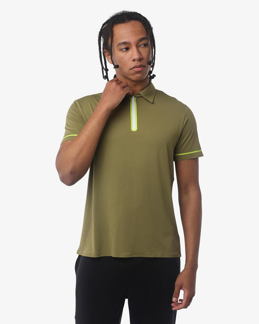 JAKED Мужская рубашка-поло цвета милитари из синтетического материала для фитнеса.
JAKED Мужская рубашка-поло цвета милитари из синтетического материала для фитнеса.