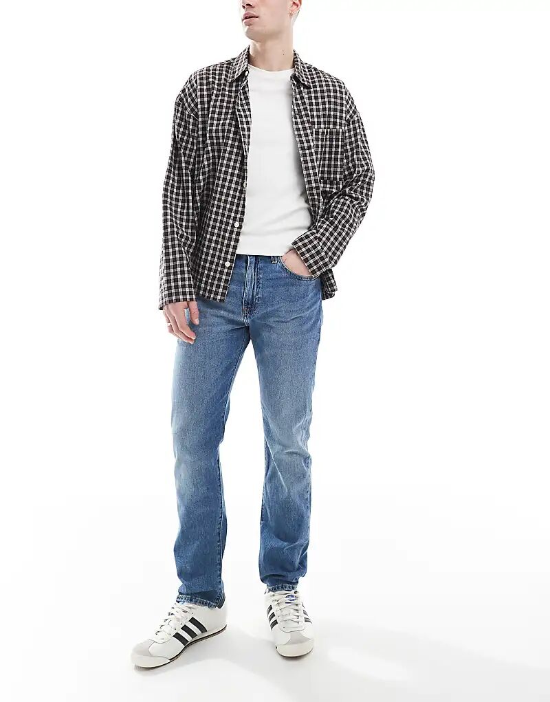 502 зауженные джинсы средней потертости Levi's
502 зауженные джинсы средней потертости Levi's