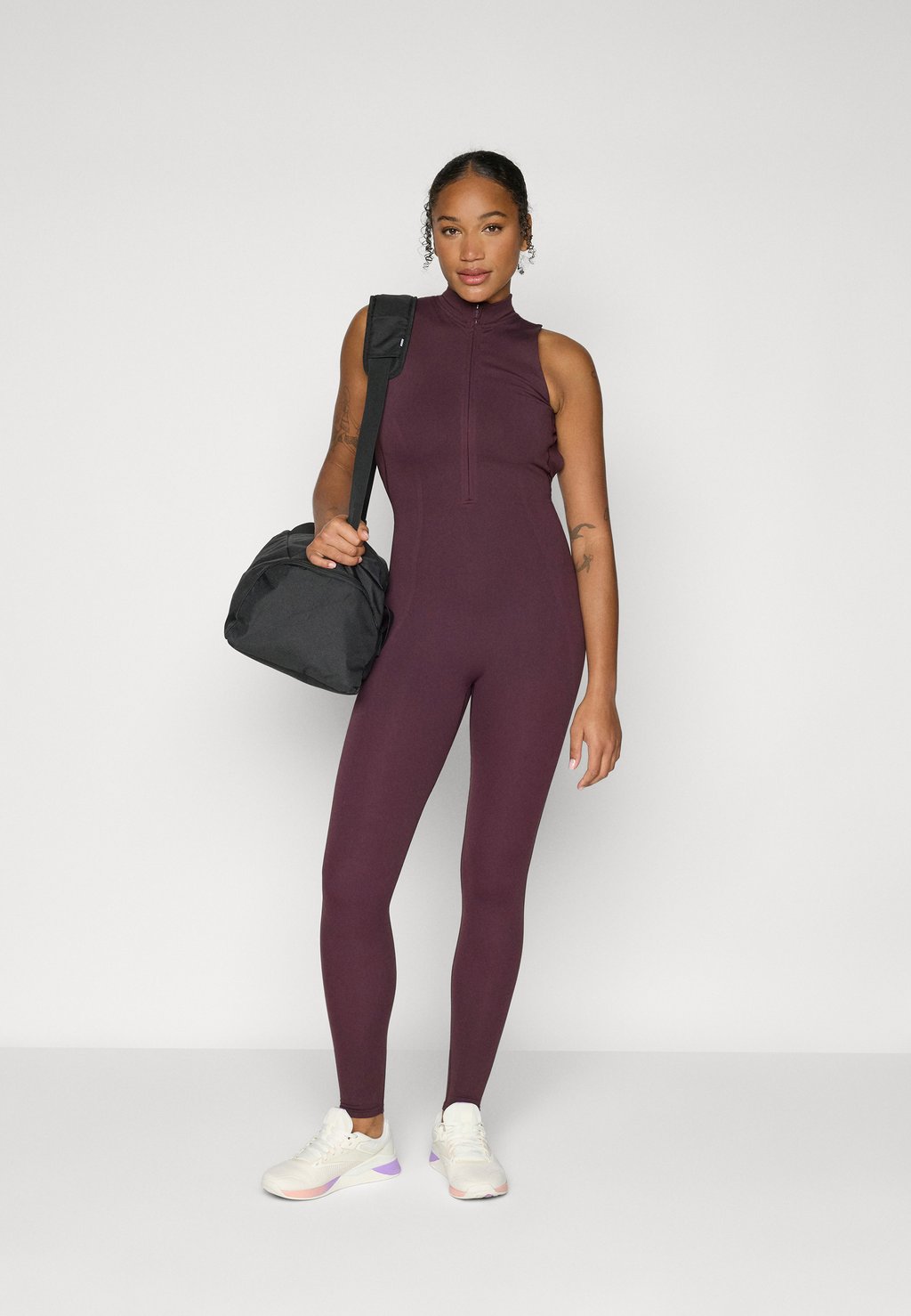 Спортивный костюм SLEEK SEAMLESS ZIP FRONT SCULPT JUMPSUIT Fabletics, темно-красный 
Спортивный костюм SLEEK SEAMLESS ZIP FRONT SCULPT JUMPSUIT Fabletics, темно-красный