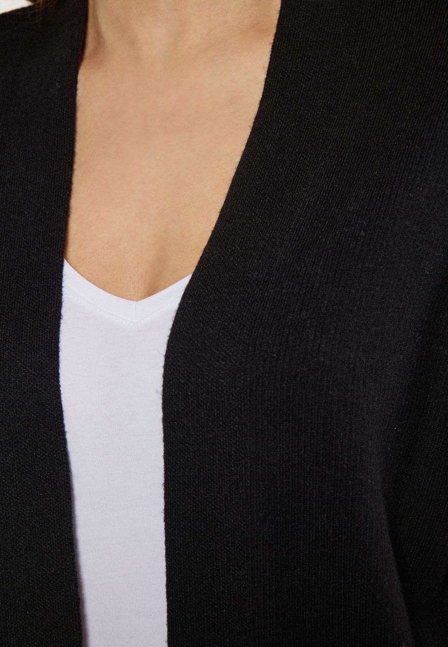 Кардиган usha CO-BRANDED WITH GAYA, Schwarz/Black
Кардиган usha CO-BRANDED WITH GAYA, Schwarz/Black