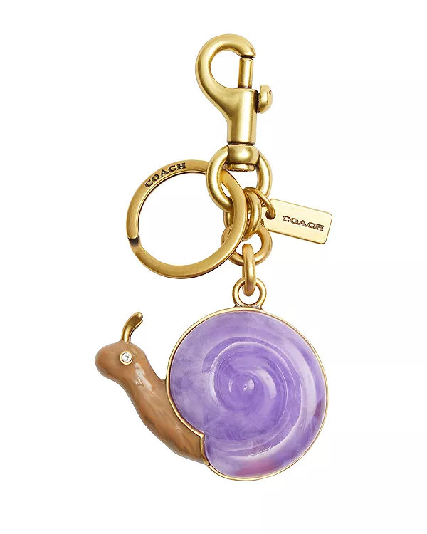 Брелок в виде улитки для сумки Coach, фиолетовый
Брелок в виде улитки для сумки Coach, фиолетовый