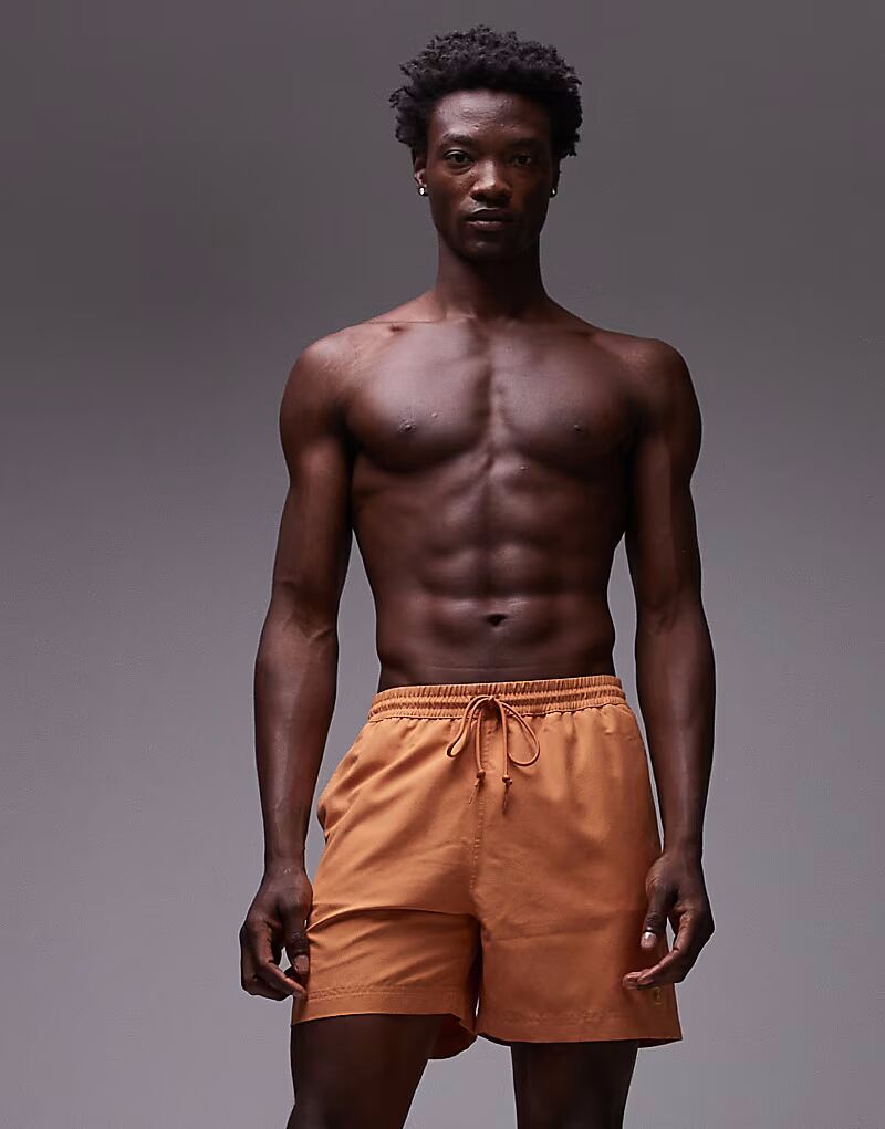 Плавки-шорты Chase оранжевого цвета Carhartt Wip
Плавки-шорты Chase оранжевого цвета Carhartt Wip