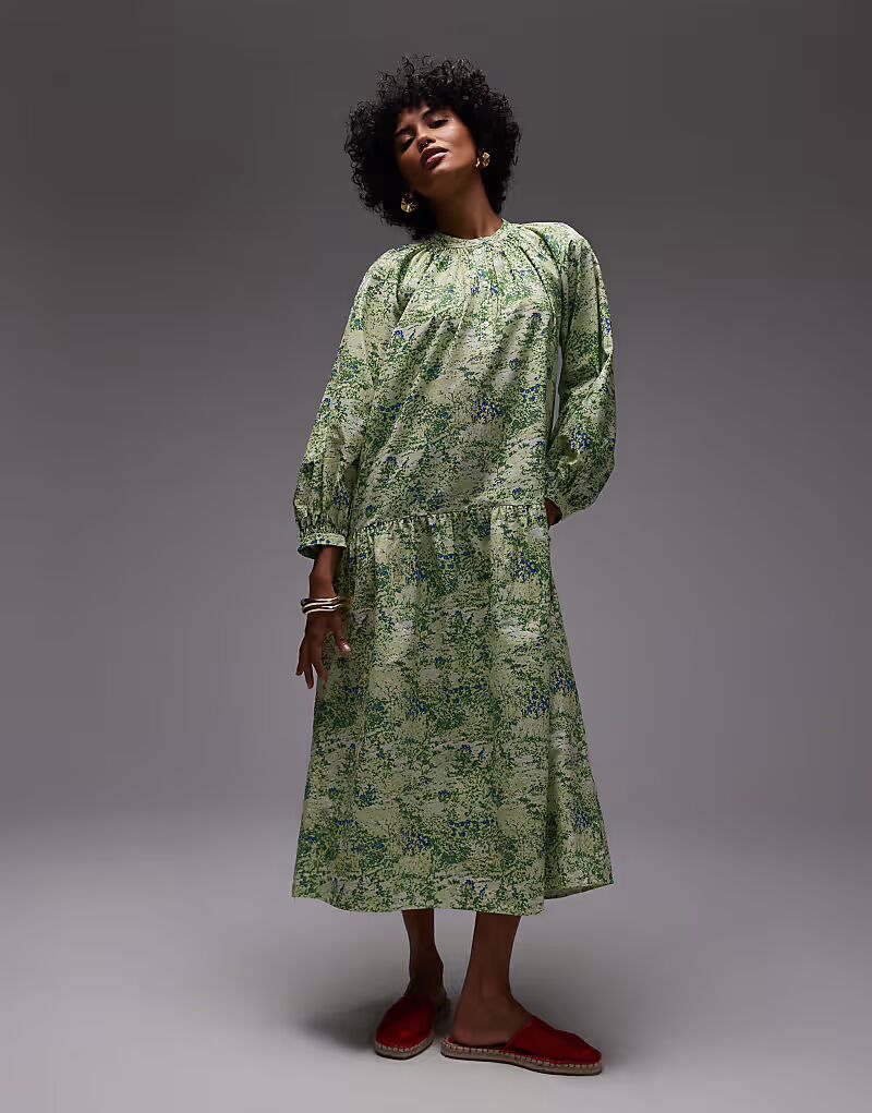 Платье-халат мидакси ARKET из чистого хлопка с заниженной талией и принтом зеленых листьев
Платье-халат мидакси ARKET из чистого хлопка с заниженной талией и принтом зеленых листьев