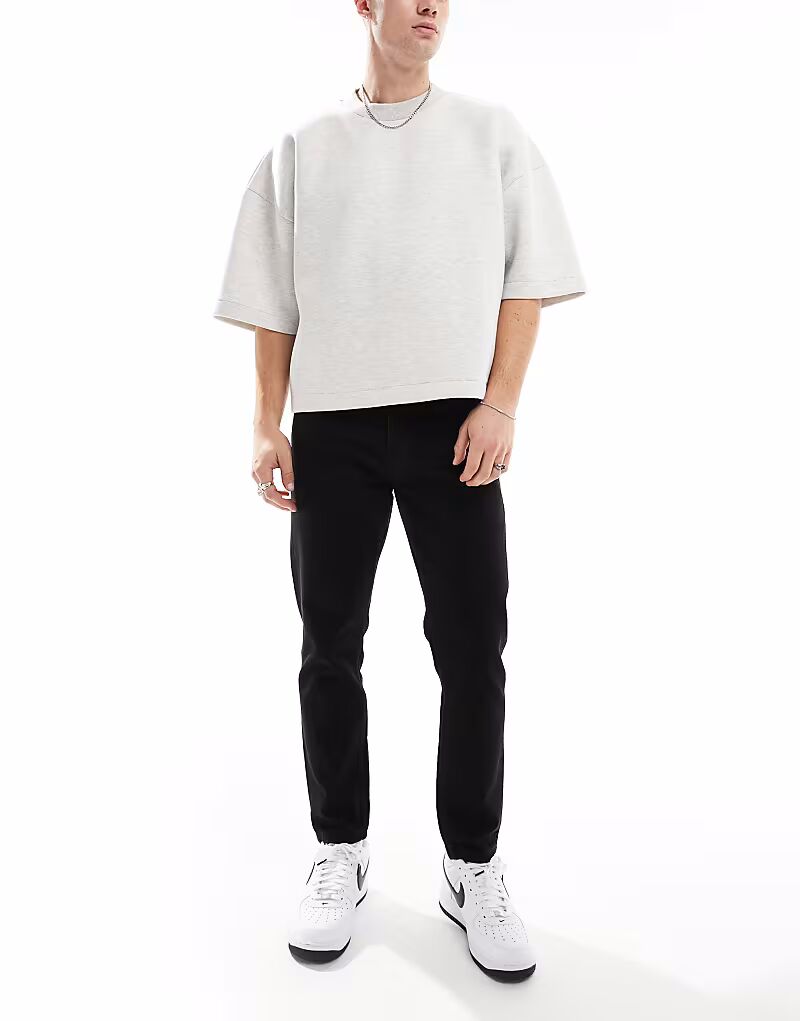 Джинсы DTT с зауженным кроем, жесткие, черного цвета
Джинсы DTT с зауженным кроем, жесткие, черного цвета