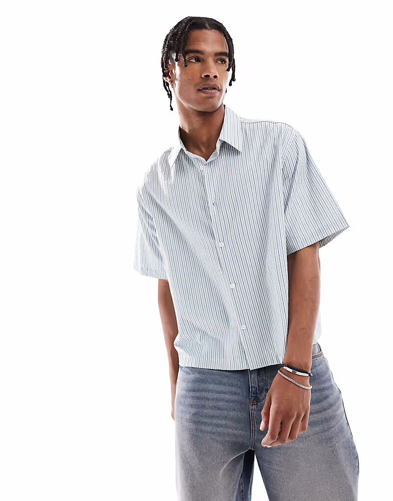 Текстурированная полосатая рубашка Bershka синего цвета
Текстурированная полосатая рубашка Bershka синего цвета