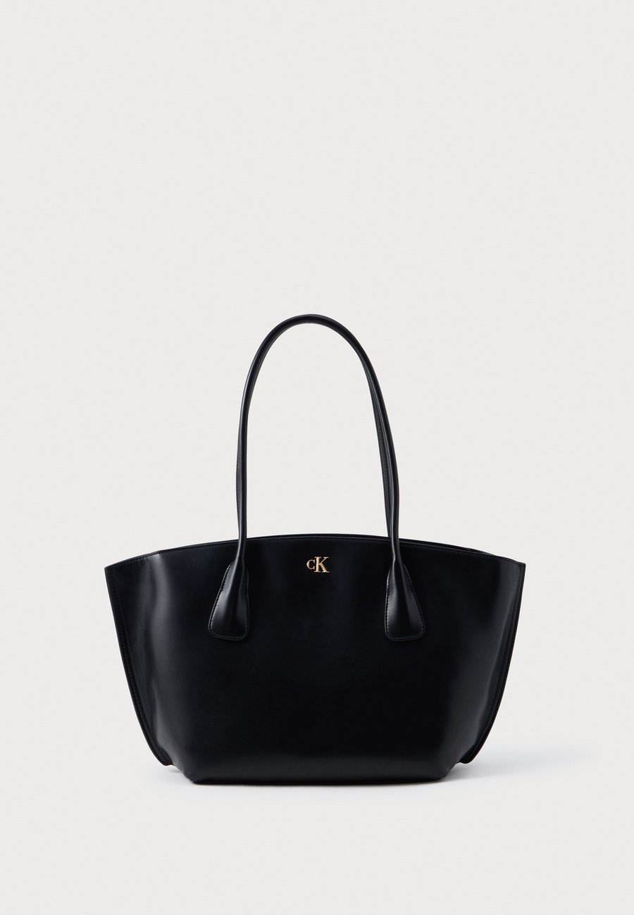Сумка-шоппер Calvin Klein MEDIUM DOME TOTE, Black/Antique Light Gold-Coloured/Black
Сумка-шоппер Calvin Klein MEDIUM DOME TOTE, Black/Antique Light Gold-Coloured/Black
