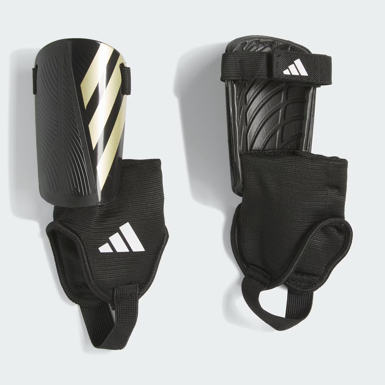 Защитные щитки Tiro Match детские Adidas, цвет Black/Gold Metallic/White
Защитные щитки Tiro Match детские Adidas, цвет Black/Gold Metallic/White