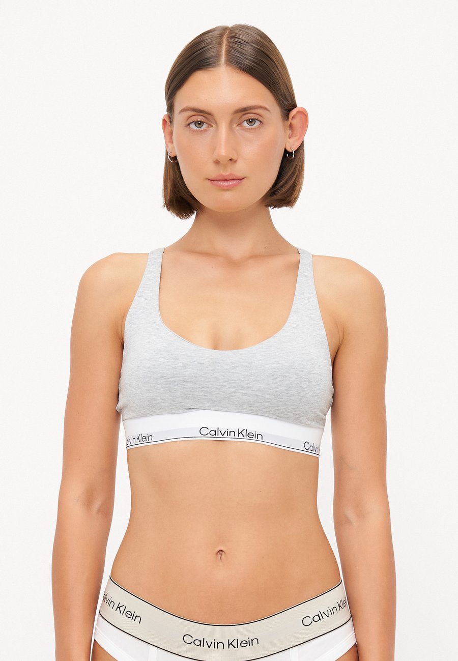 Бюстгальтер Calvin Klein Underwear LIGHTLY LINED BRALETTE ICON, Grey Heather/Light Grey
Бюстгальтер Calvin Klein Underwear LIGHTLY LINED BRALETTE ICON, Grey Heather/Light Grey