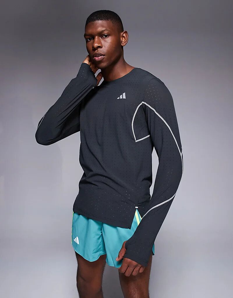 Светоотражающий топ с длинными рукавами Adidas Running Adizero черного цвета
Светоотражающий топ с длинными рукавами Adidas Running Adizero черного цвета