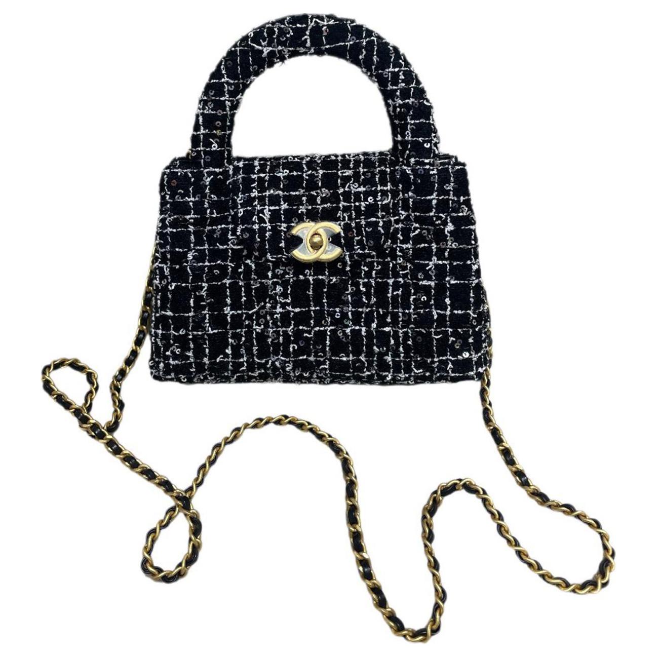 CHANEL Твидовая плетеная шерстяная сумка через плечо, кроссбоди, мини-клатч женская black & white
CHANEL Твидовая плетеная шерстяная сумка через плечо, кроссбоди, мини-клатч женская black & white