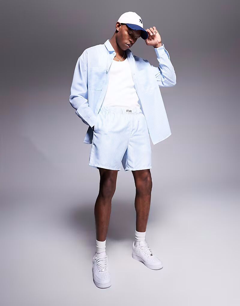 Плавки-шорты ASOS DESIGN средней длины в белую и синюю полоску с нашивкой
Плавки-шорты ASOS DESIGN средней длины в белую и синюю полоску с нашивкой