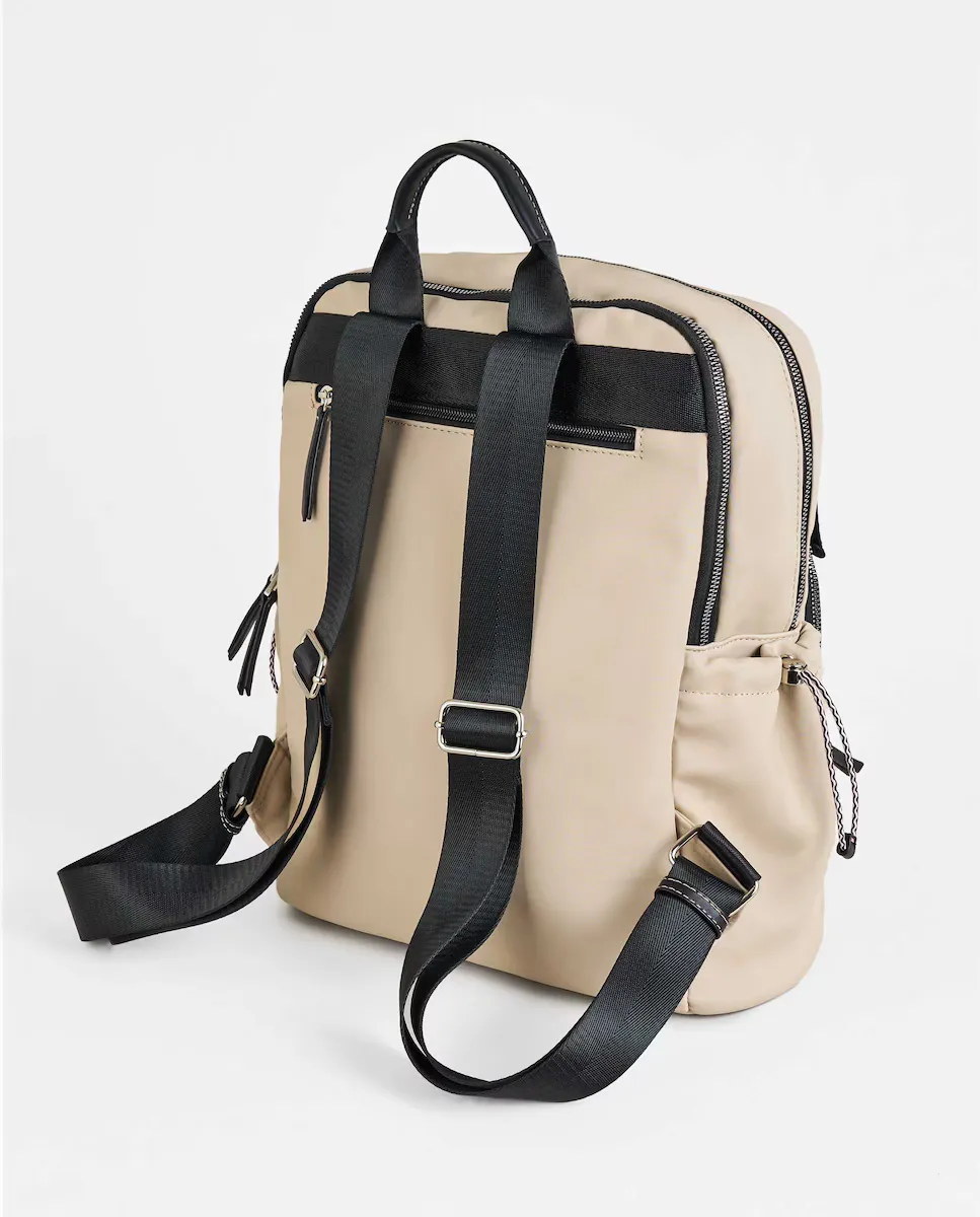 Бежевый женский рюкзак из прорезиненного нейлона PACOMARTINEZ, бежевый
Бежевый женский рюкзак из прорезиненного нейлона PACOMARTINEZ, бежевый