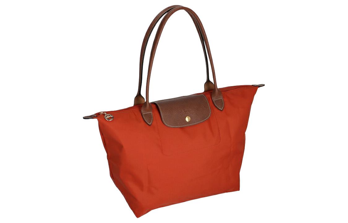 LONGCHAMP Сумка Le Pliage Recycled Canvas With Leather Trim Dumpling через плечо женская orange red
LONGCHAMP Сумка Le Pliage Recycled Canvas With Leather Trim Dumpling через плечо женская orange red