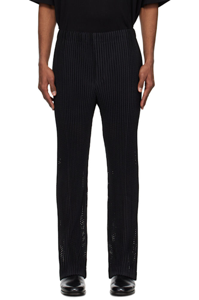 Черные сетчатые брюки HOMME PLISSÉ ISSEY MIYAKE
Черные сетчатые брюки HOMME PLISSÉ ISSEY MIYAKE