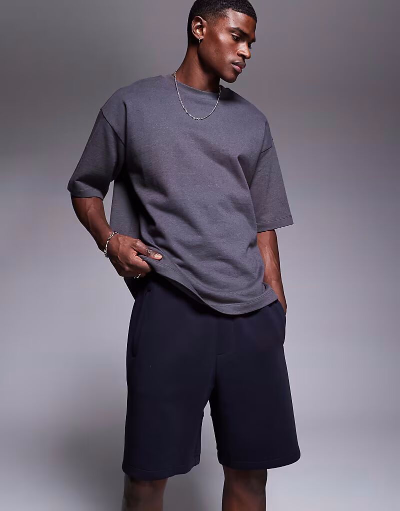 Спортивные шорты с логотипом Armani Exchange темно-синего цвета
Спортивные шорты с логотипом Armani Exchange темно-синего цвета