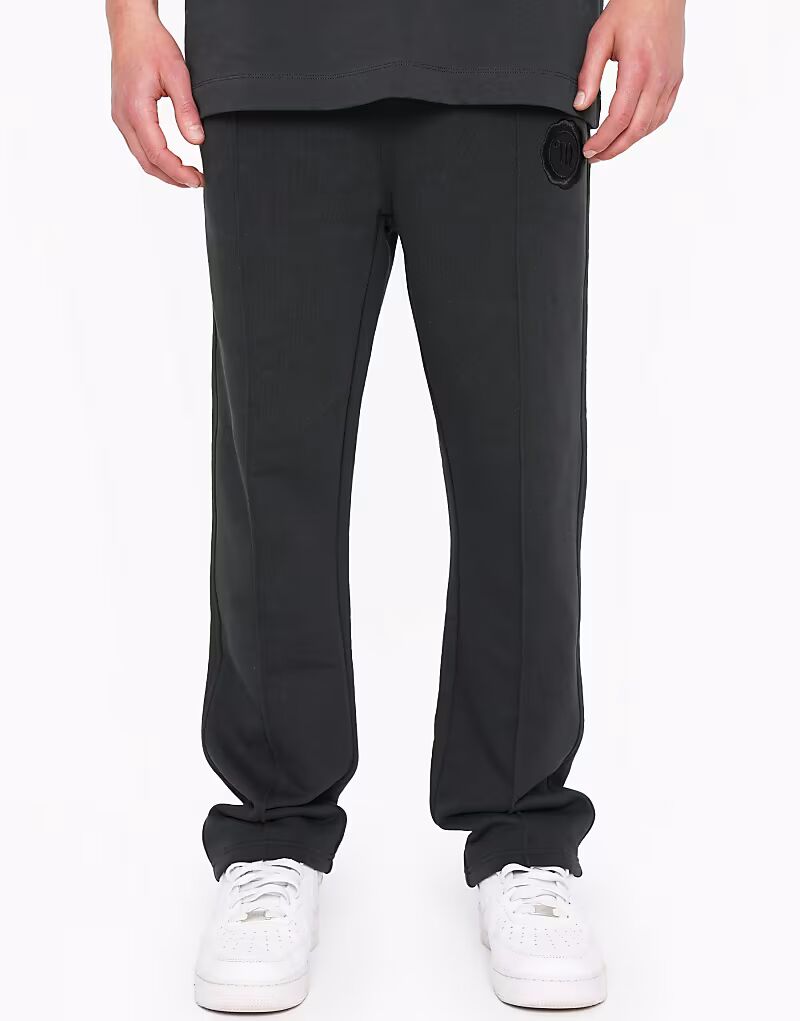 Multiply Apparel - Creased - Спортивные брюки черного цвета с изображением тюленя
Multiply Apparel - Creased - Спортивные брюки черного цвета с изображением тюленя