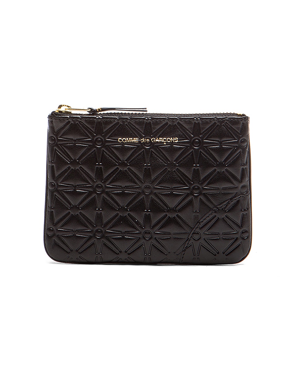 Маленькая сумка с тиснением в виде звезды Comme Des Garcons, Black
Маленькая сумка с тиснением в виде звезды Comme Des Garcons, Black