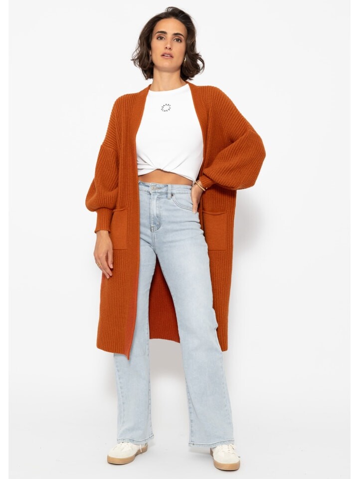 Кардиган SASSYCLASSY Lang Cardigan mit Taschen, цвет Rostbraun
Кардиган SASSYCLASSY Lang Cardigan mit Taschen, цвет Rostbraun