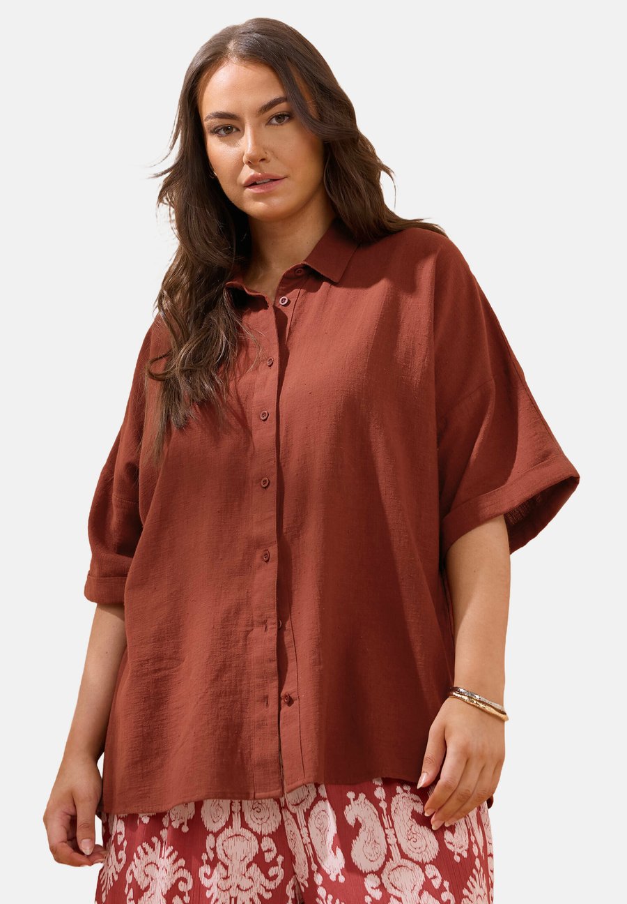 Блуза Evans Button-down blouse, Orange/Ochre
Блуза Evans Button-down blouse, Orange/Ochre