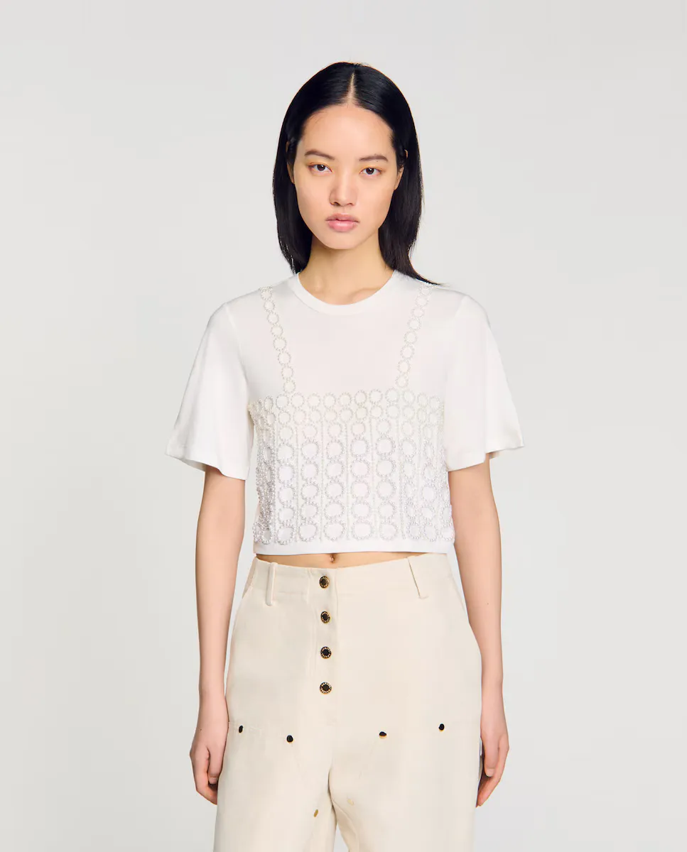 Женская укороченная футболка со стразами Sandro, белый
Женская укороченная футболка со стразами Sandro, белый