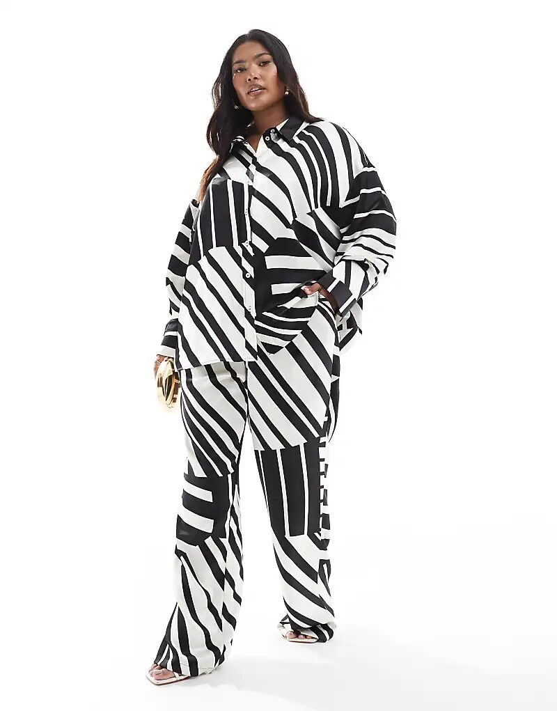 Широкие брюки 4th & Reckless Plus из сатина с черно-белым принтом
Широкие брюки 4th & Reckless Plus из сатина с черно-белым принтом