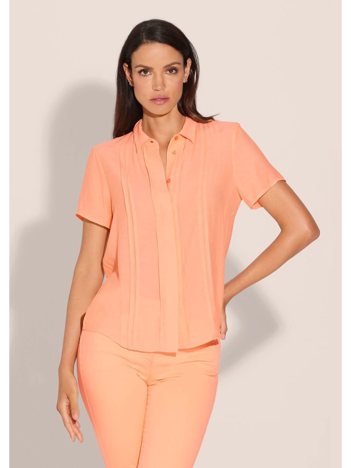 MADELEINE Блузка с изящными складками персикового цвета
MADELEINE Блузка с изящными складками персикового цвета