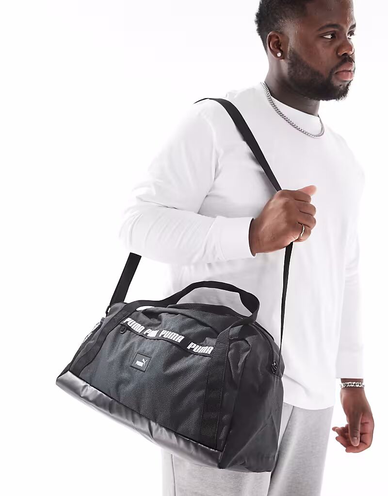 Маленькая спортивная сумка PUMA PHASE TAPE черного цвета
Маленькая спортивная сумка PUMA PHASE TAPE черного цвета